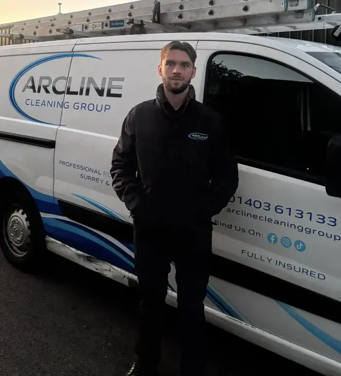 Lee from Arcline Cleaning Group standing in front of the Arcline van